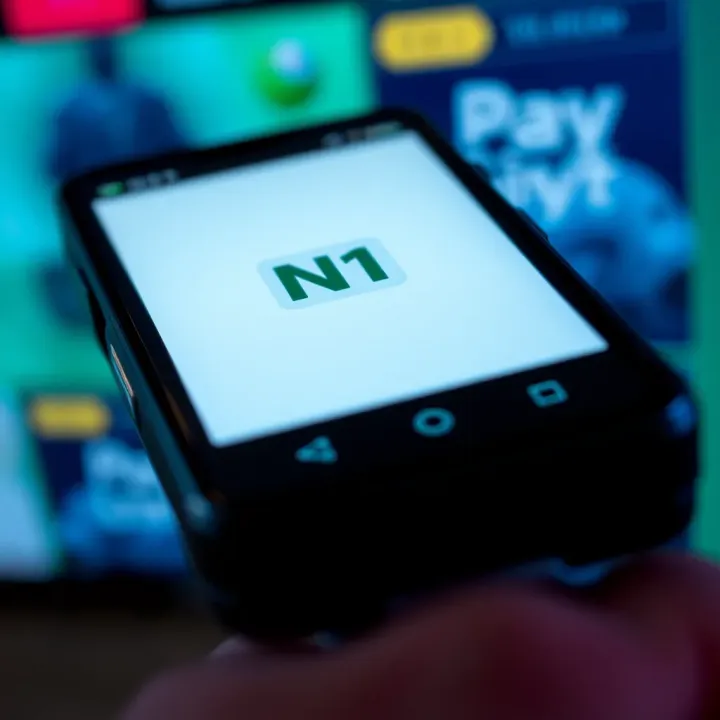 Digital Payment Confirmation Featuring Nigerian Currency Symbol Mobile phone screen displaying a digital payment confirmation with Nigerian currency symbol